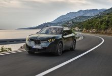 Front three-quarter view of the BMW iX3 M60 xDrive with M Yellow Lights