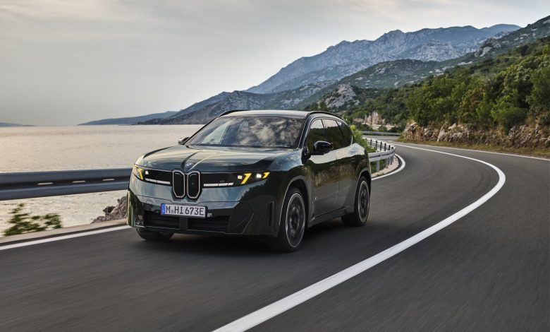 Front three-quarter view of the BMW iX3 M60 xDrive with M Yellow Lights